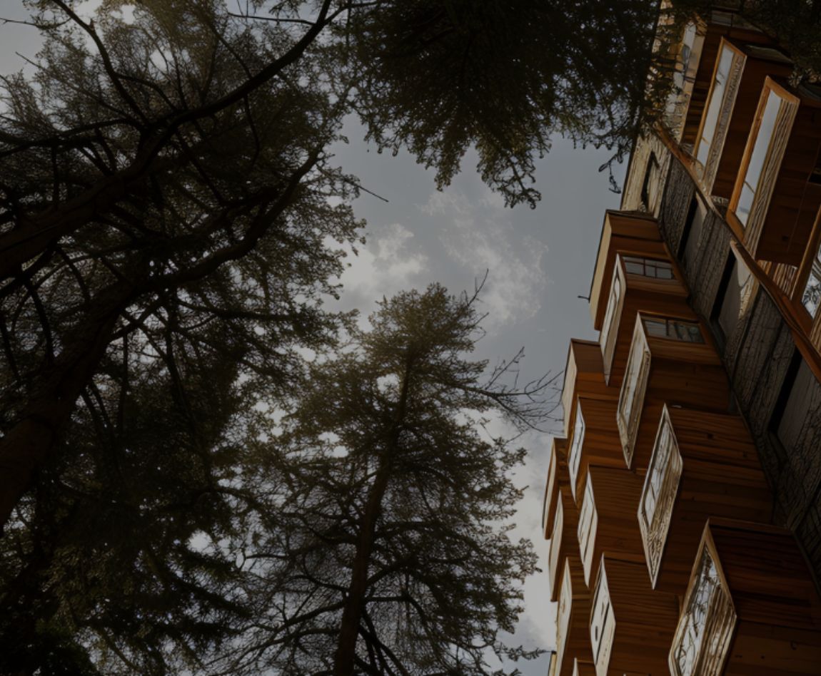 Un bâtiment avec des arbres devant